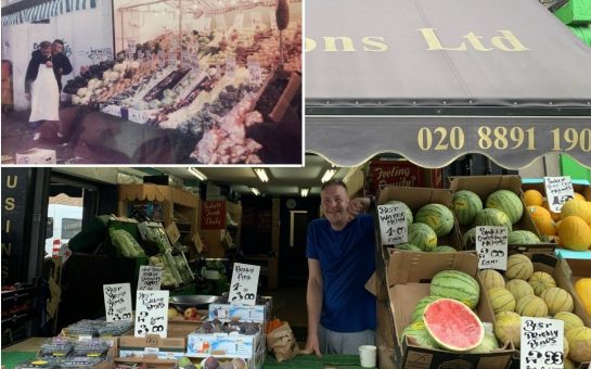 John Cooper serving customers leaning over the counter of his grocery and embedded image of his great-grandfather outside the shop