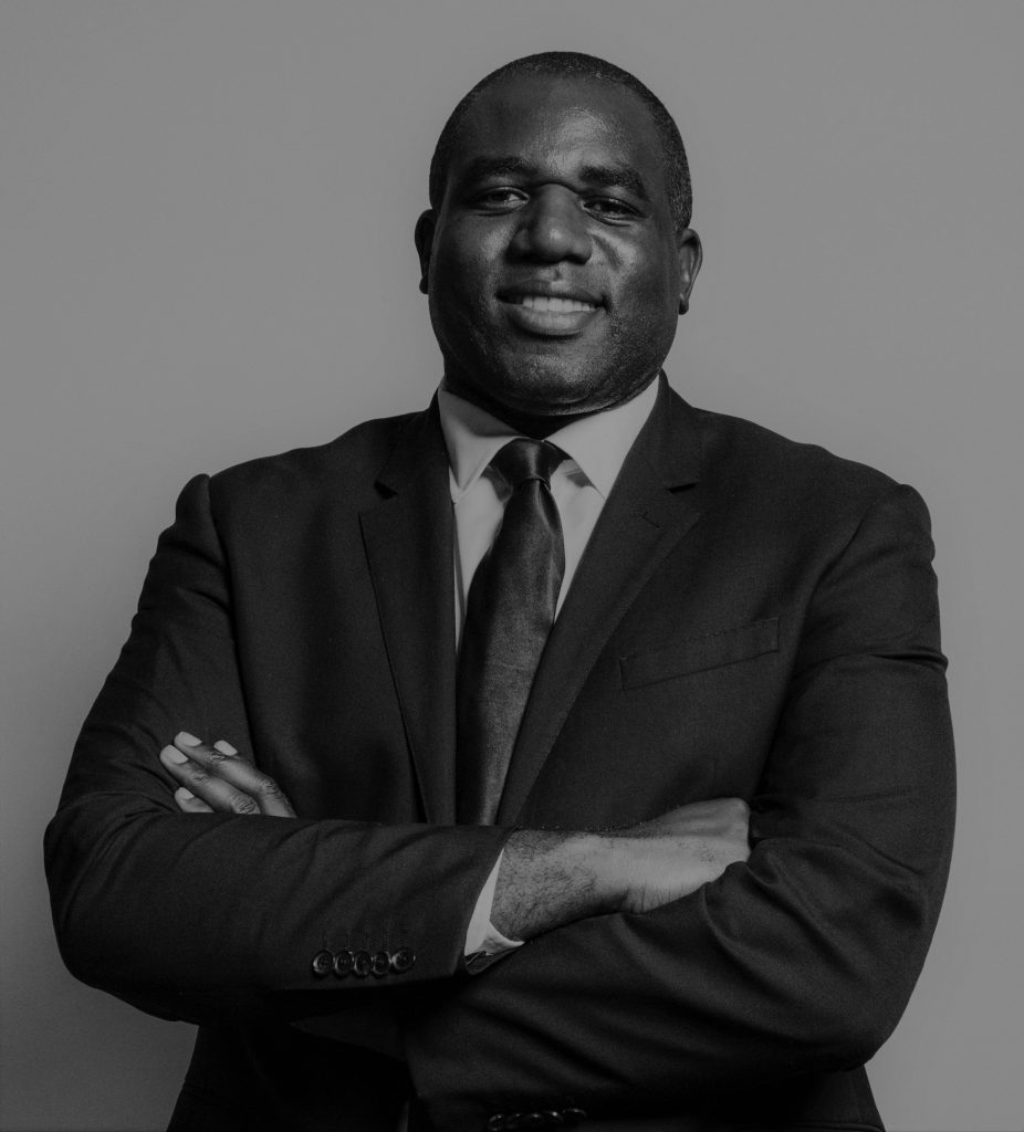 David Lammy smiling, crossing his arms