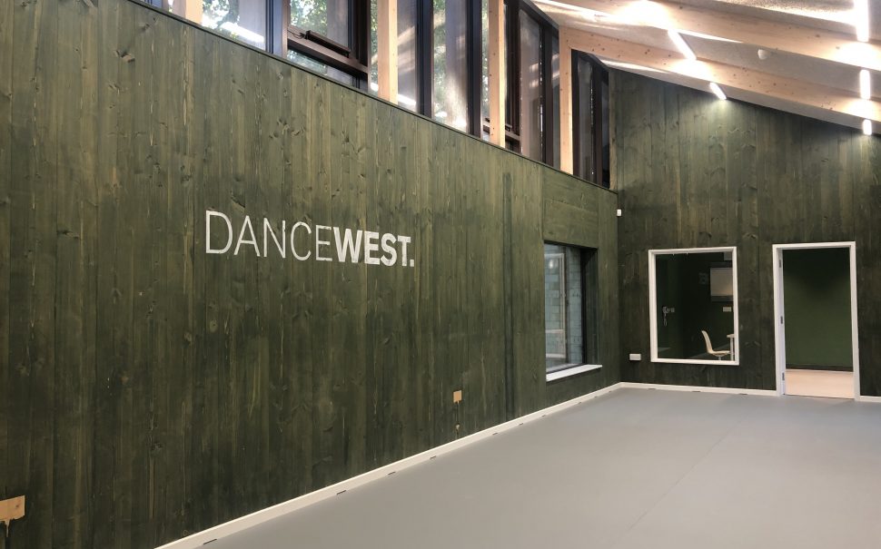 DanceWest's logo on the wall at its new studio space