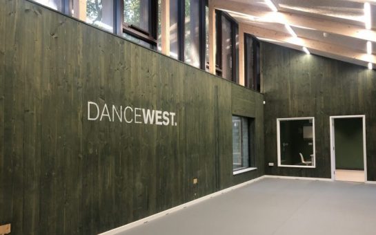 DanceWest's logo on the wall at its new studio space