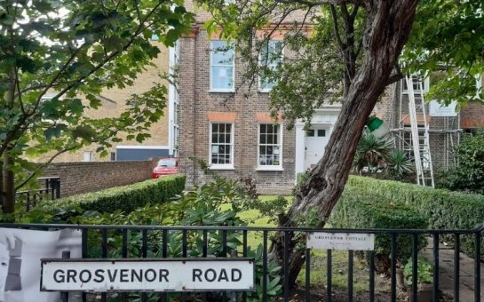 Grosvenor House nursery exterior with Grosvenor Road sign on gate in foreground