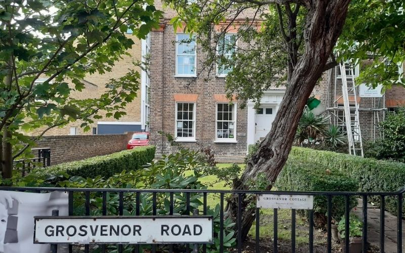 Grosvenor House nursery exterior with Grosvenor Road sign on gate in foreground