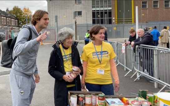 Players donate food to Dons at every home game