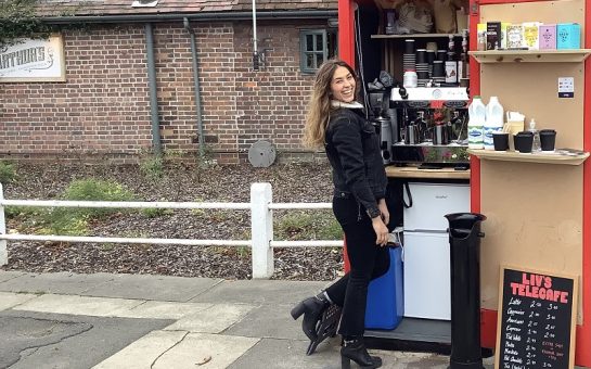 Liv with her coffee shop telephone box