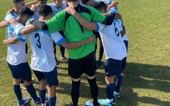 FC Deportivo huddling before a match