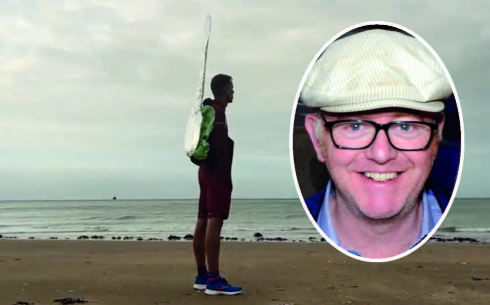 Harry Baker, dressed as a falafel on a spoon, stands sentient on a Margate beach. Chris Evans inset.