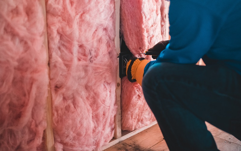 A photo of wall insulation being installed 