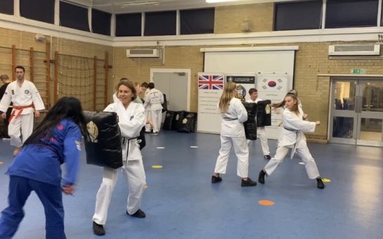 Women performing self-defence drills