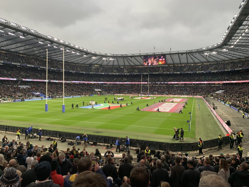 The Twickenham Stadium pitch covered with the flags of England and South Africa