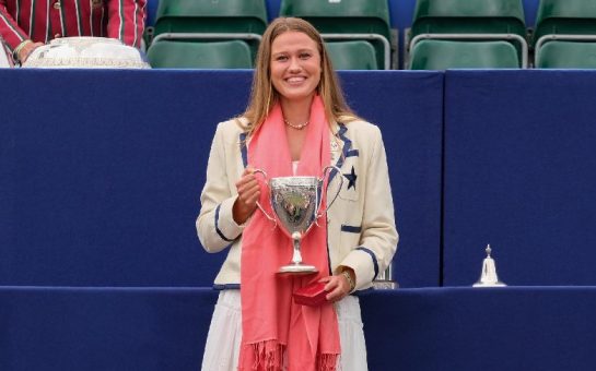 Lola Anderson holding the Princess Royal Challenge Cup at Henley