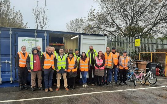reuse shop group outside the new shop