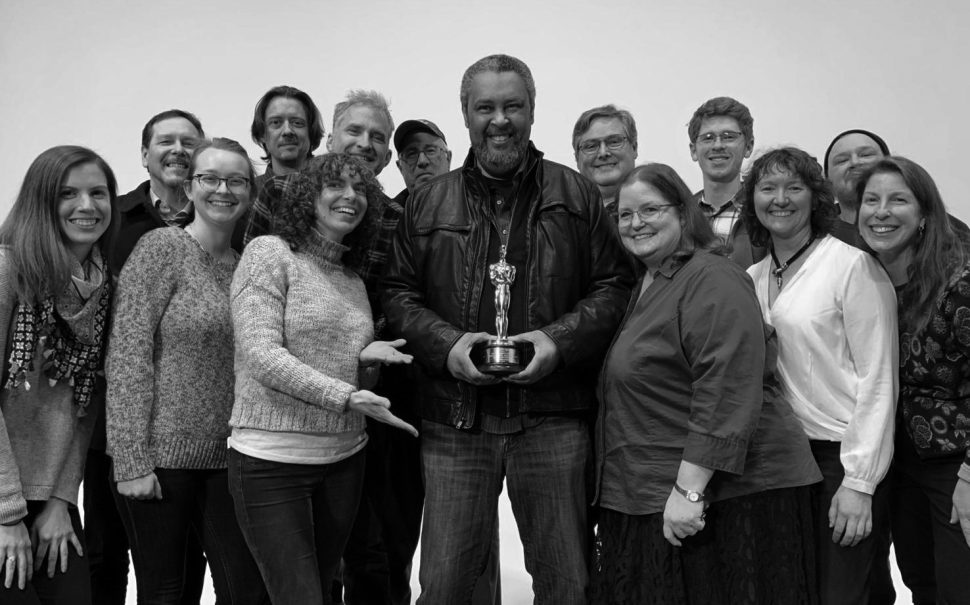 Kevin Willmott sharing his Oscar win with colleagues at the University of Kansas
