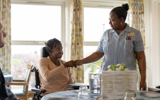 British home staff attending to resident