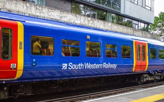 A South Western Railway train stopped at a station