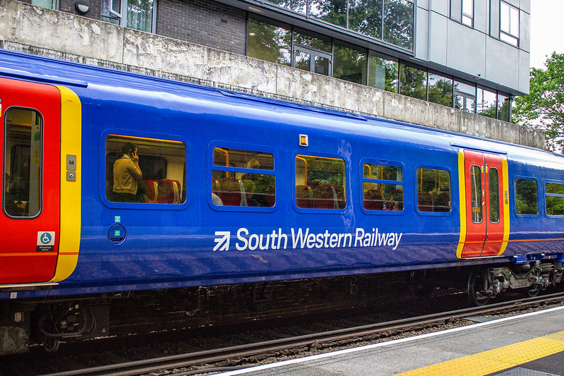 A South Western Railway train stopped at a station
