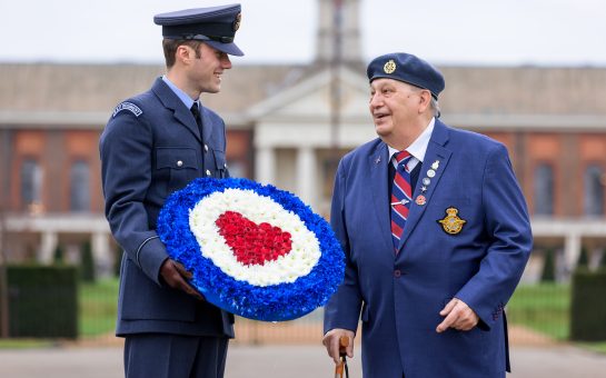 RAF veterans holding wreath