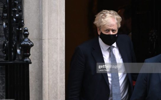 Boris Johnson stock image of him leaving PMQs