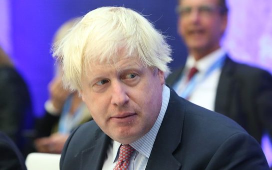 Boris Johnson looks over his shoulder