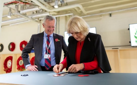 HRH Duchess of Cornwall makes a remembrance cross at the Poppy Factory.