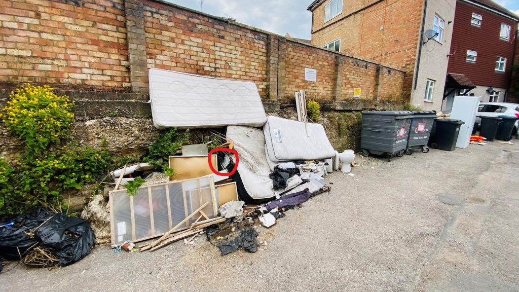 Picture of rubbish with the council sticker applied to it, despite not being picked up