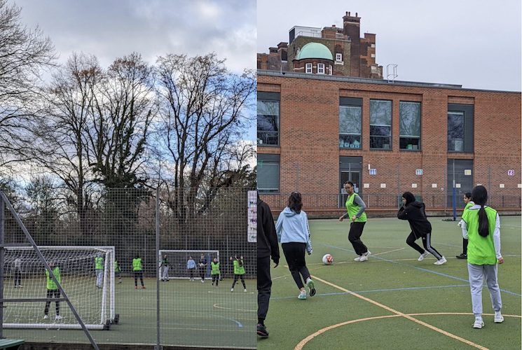 Girls playing football.