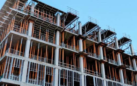 A building under construction with scaffolding.