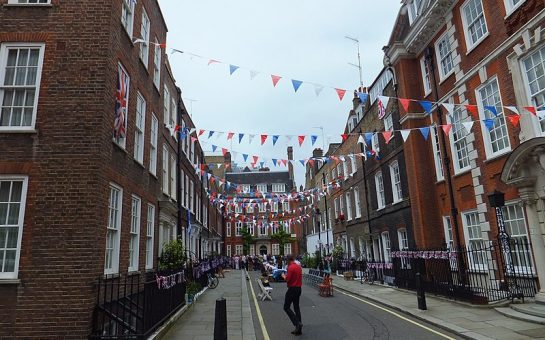 a street with flags and bunting up celebrating the diamond jubilee