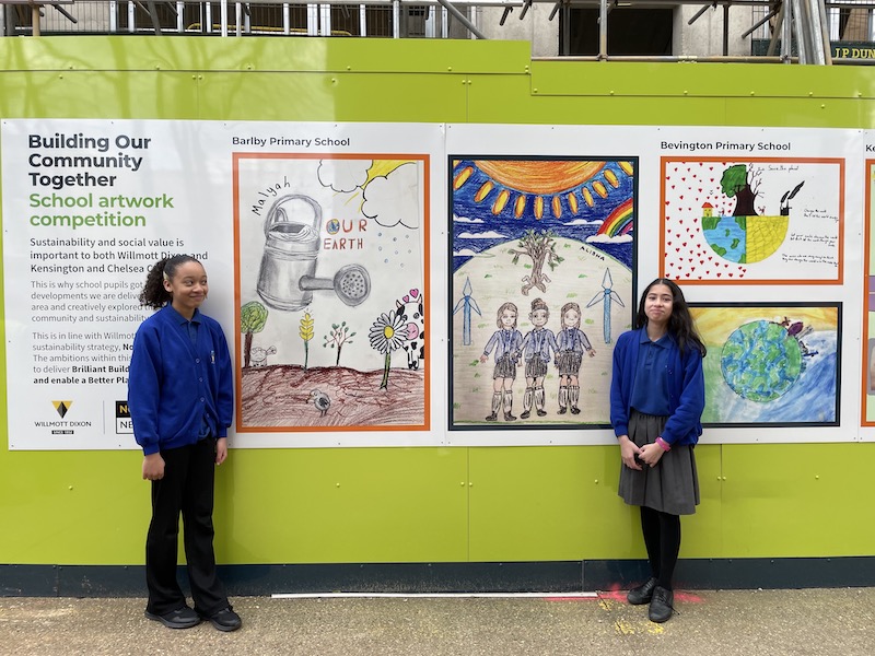 Pupils from Barlby Primary School pose with their competition art at the Kensington development site
