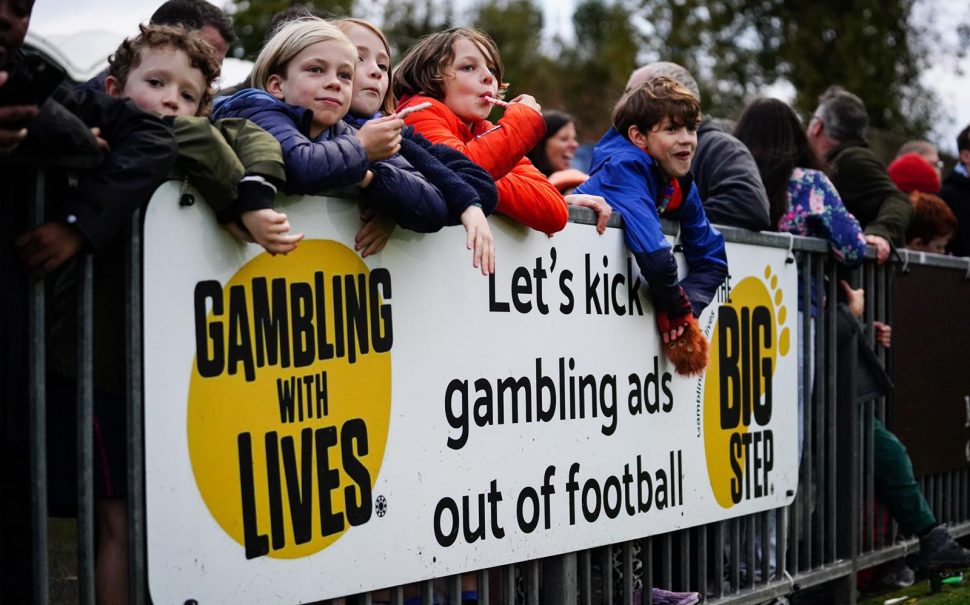a "let's kick gambling out of football" banner