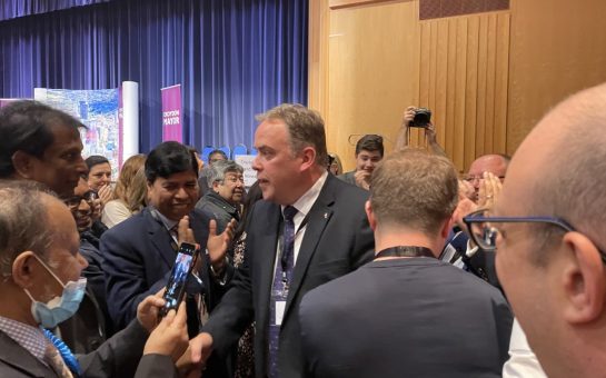 Jason Perry congratulating his Conservative councillors after winning