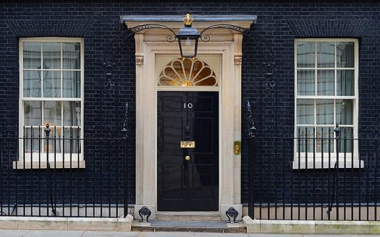 A photo of the famous black door to No. 10