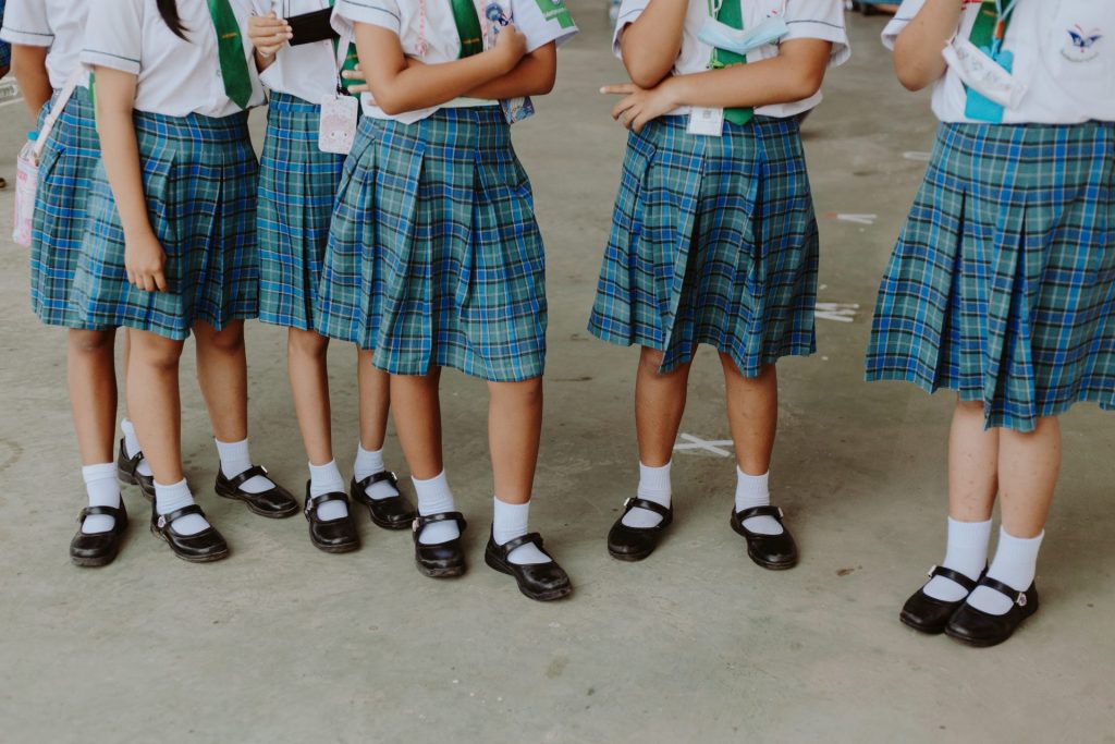 School girls standing in a playground