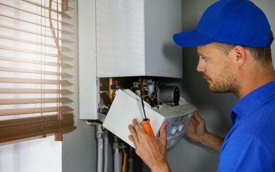 A man giving a boiler service