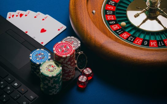 Chips, cards and a roulette wheel