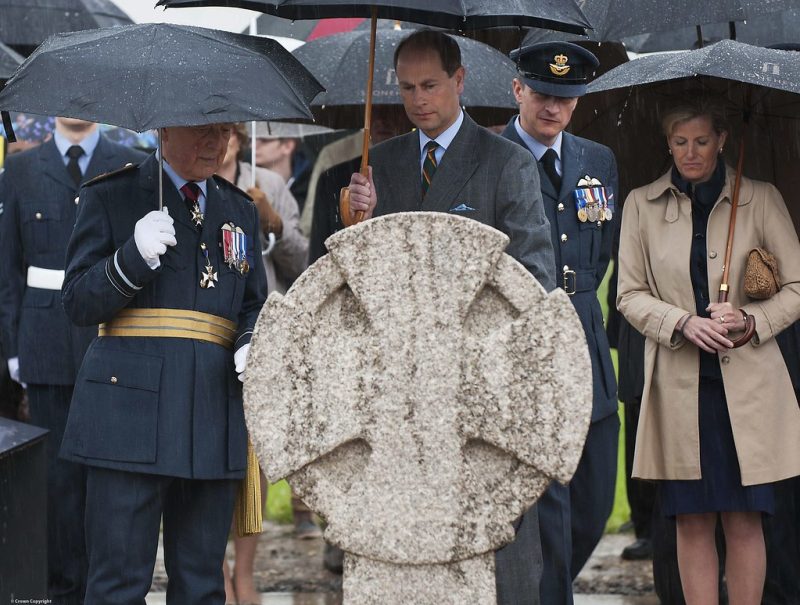 Prince Edward standing over the rededication of the Airman's Cross at Stonehenge in May 2014