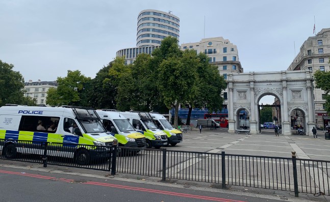 Police in London prepare for the arrival of the Queen's coffin