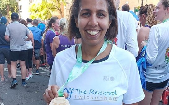 Twickenham MP, Munira Wilson, holding a medal