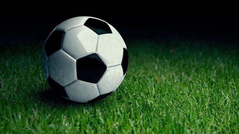 A football on a grass field