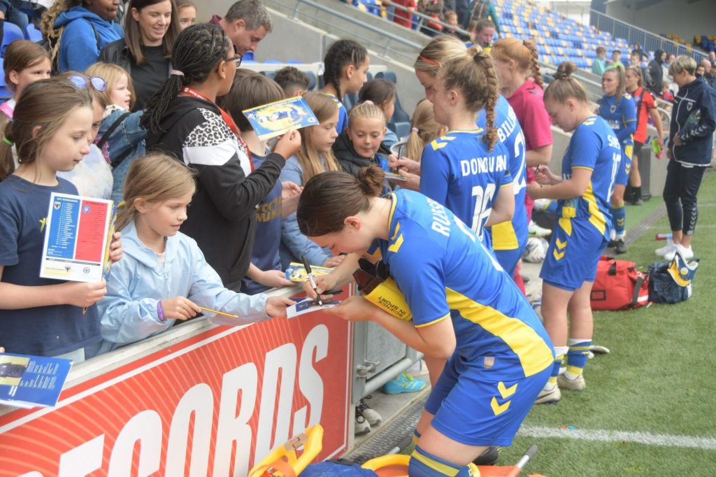 AFC Wimbledon Women greeting fans 