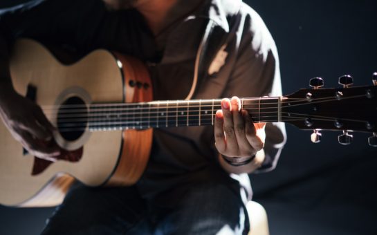 Person with guitar