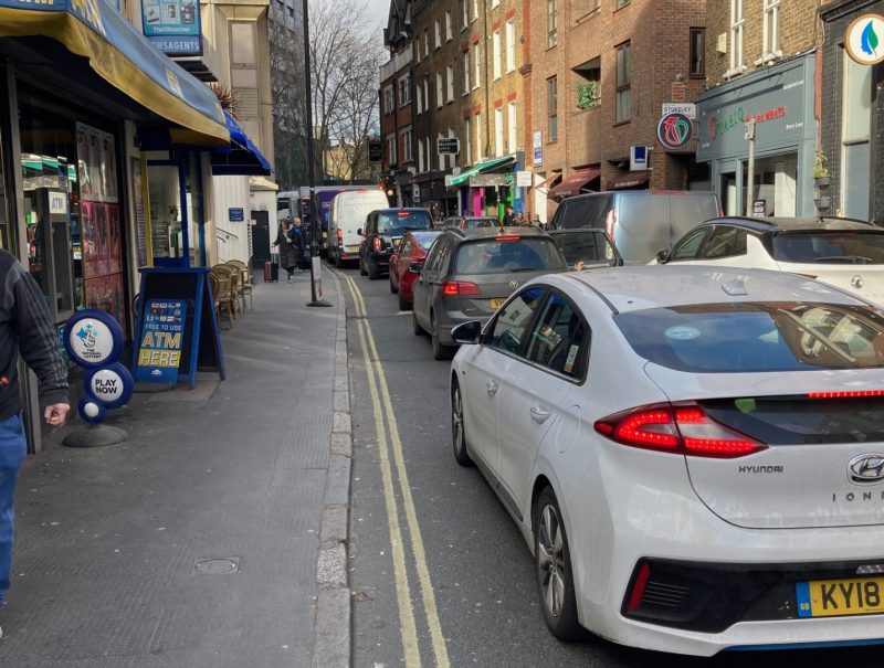 cars parked on the side of the road