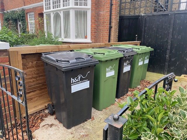 What's with all the different coloured bins and rubbish bags in London?