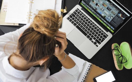 woman stressed at desk