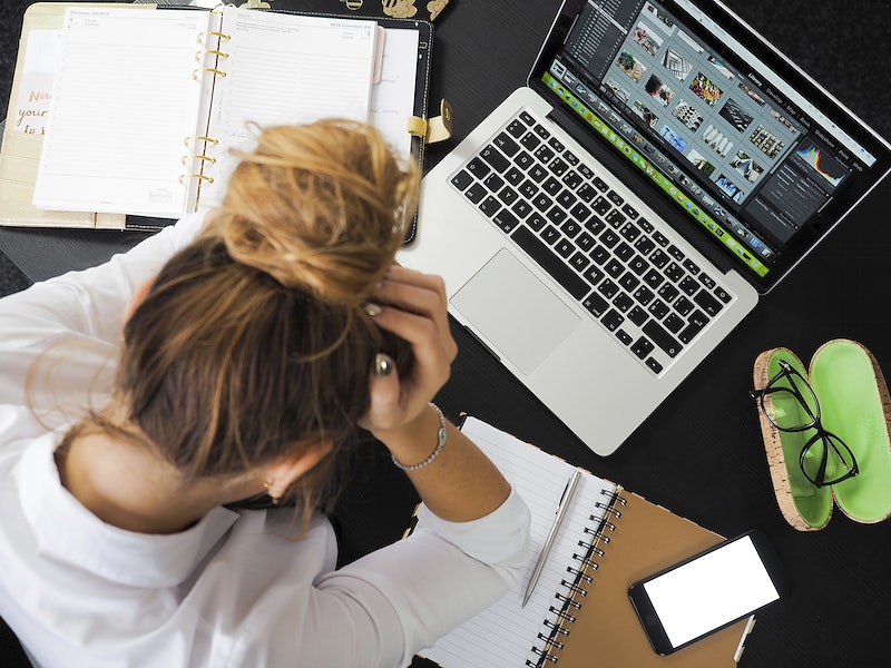 woman stressed at desk