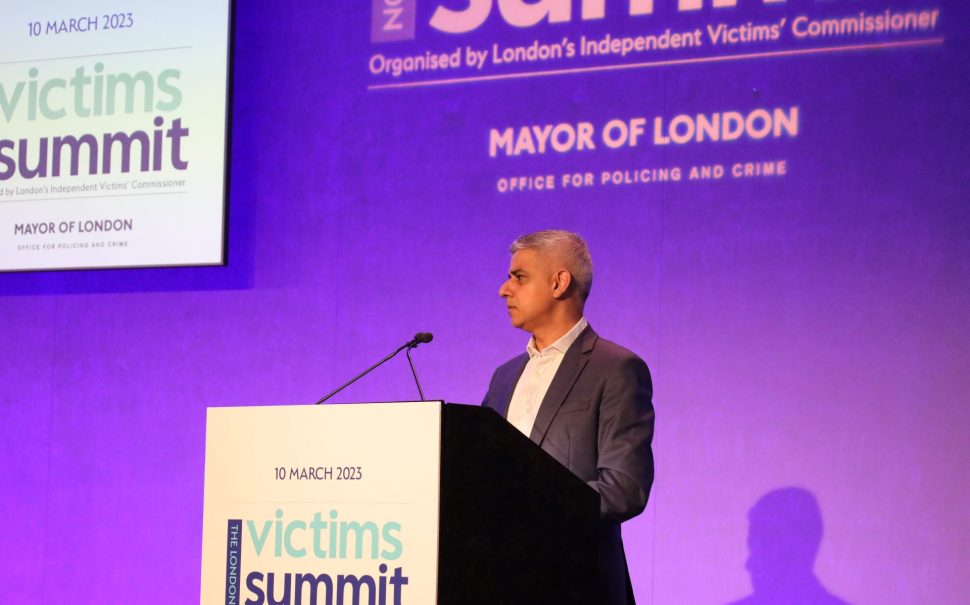 Sadiq Khan at a podium speaking