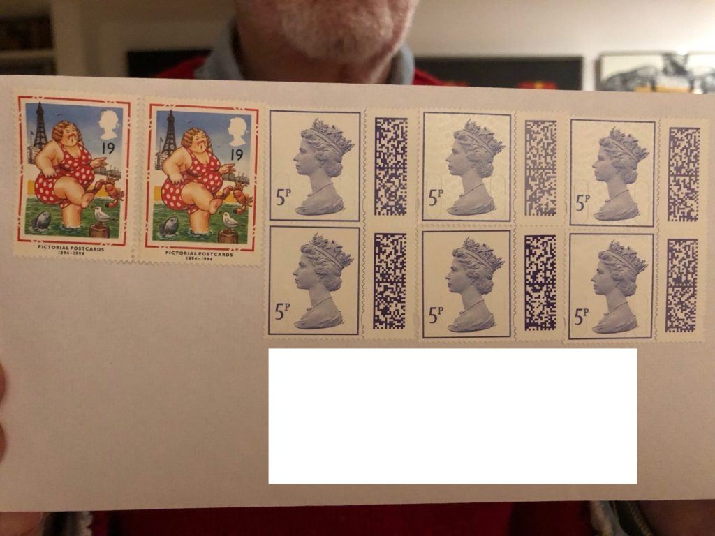 An envelope with two 19 pence stamps and six 5 pence stamps 