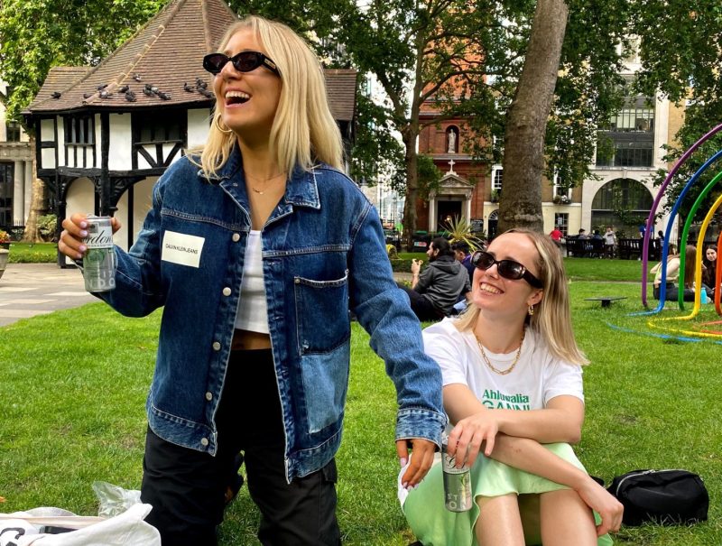 Friends laughing in a London park