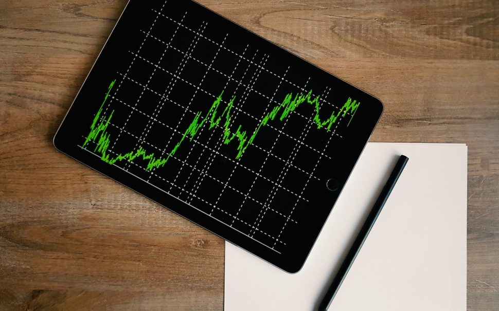 Tablet with a graph of stocks on it