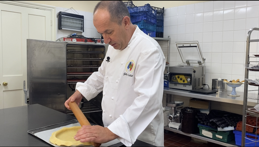 French embassy's Gilles Quillot preparing the Coronation quiche