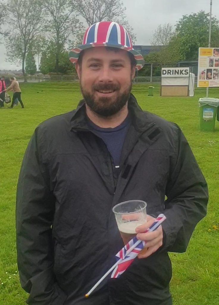 29 year old man celebrates the Coronation with his friends in Bristol